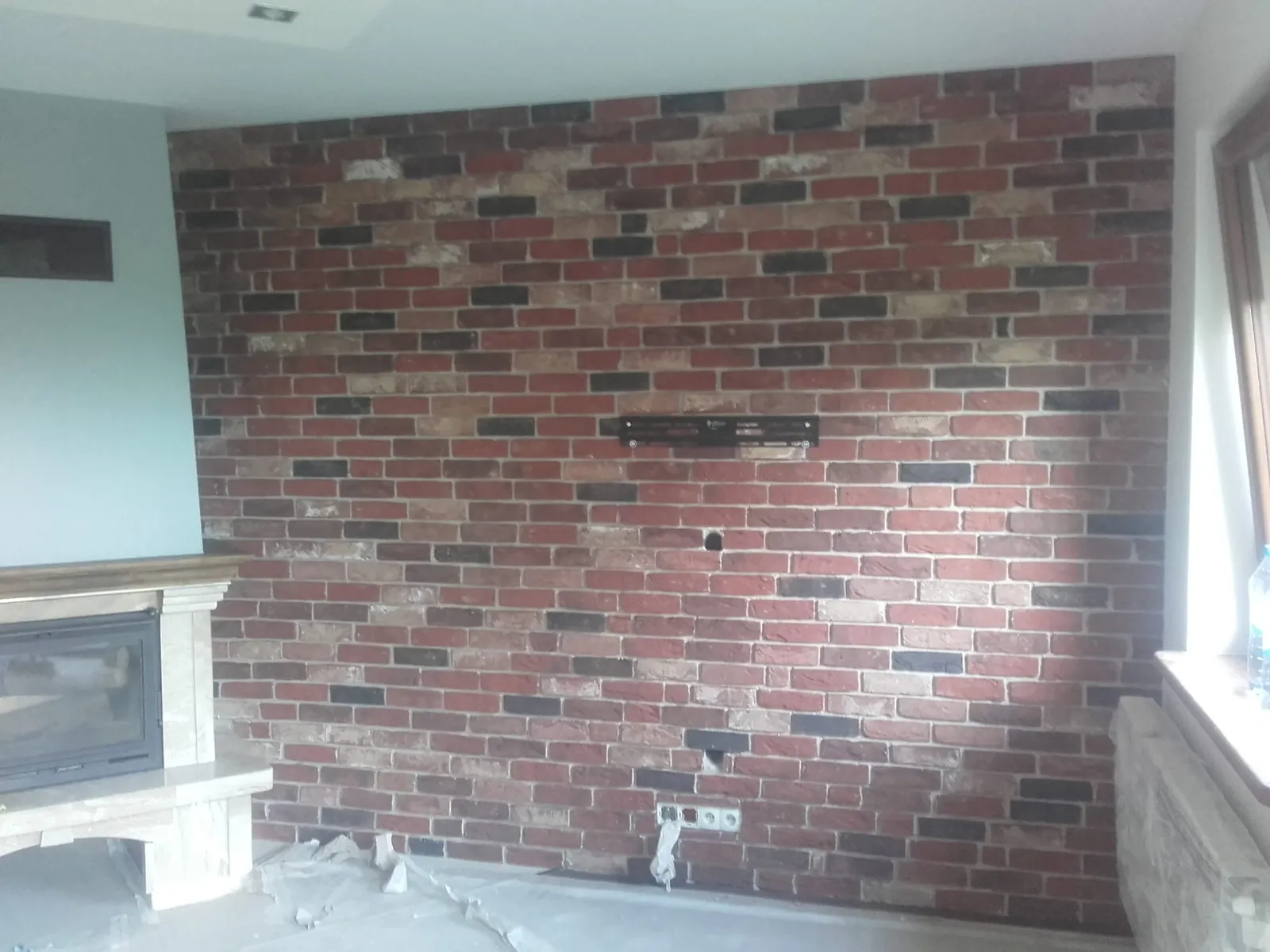 Wykończenie salonu z kominkiem Rzeszów – STYL-BUD